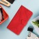 Stitched Embossed PU Leather + TPU Wallet Case with Stand & Wrist Strap for iPhone 17 Pro Max - Red
